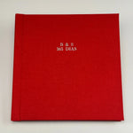 Fotolibro Premium Layflat con tapa de lino rojo y grabado plateado en hot stamping